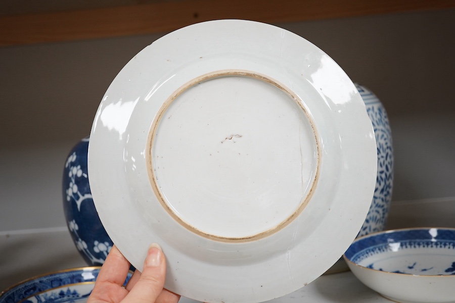 An 18th century Chinese export blue and white plate, together with two other dishes and two ginger jars. Condition - varies